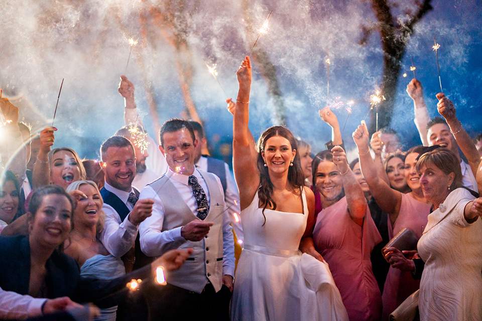 Sparklers. A wet and Rainy wedding day in Harvey's Point Wedding Venue, Donegal Ireland. Paul McGinty, Ghorm Studio Photography.